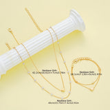 LAYERED HEART & PEARL JEWELRY SET