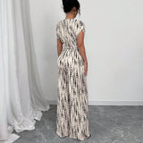 AMARISE™ | WIDE-LEG STRAP JUMPSUIT